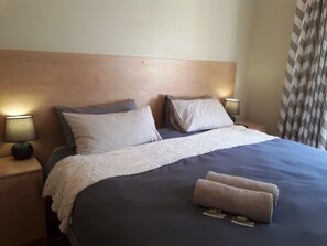 En-suite Bedroom | Minibar, in-room safe, free WiFi, bed sheets - PTA East Guest Rooms (Pretoria)
