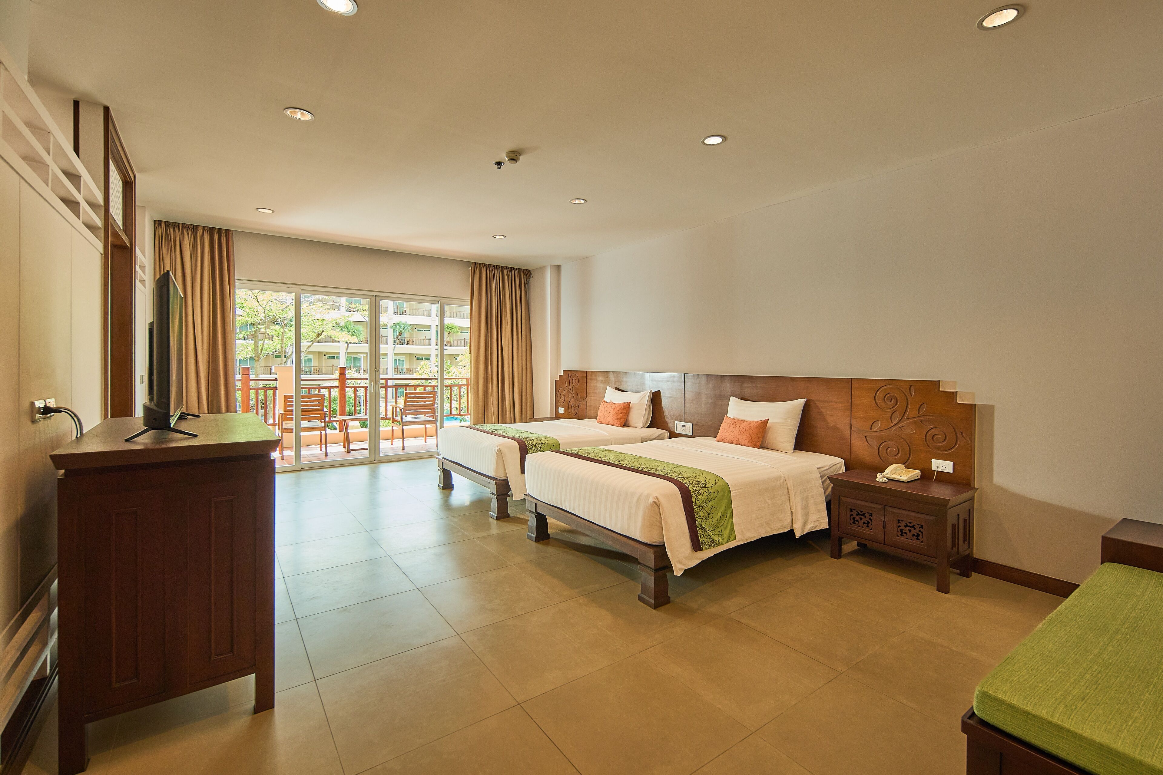 Family Suite Twin | Minibar, in-room safe, desk, laptop workspace