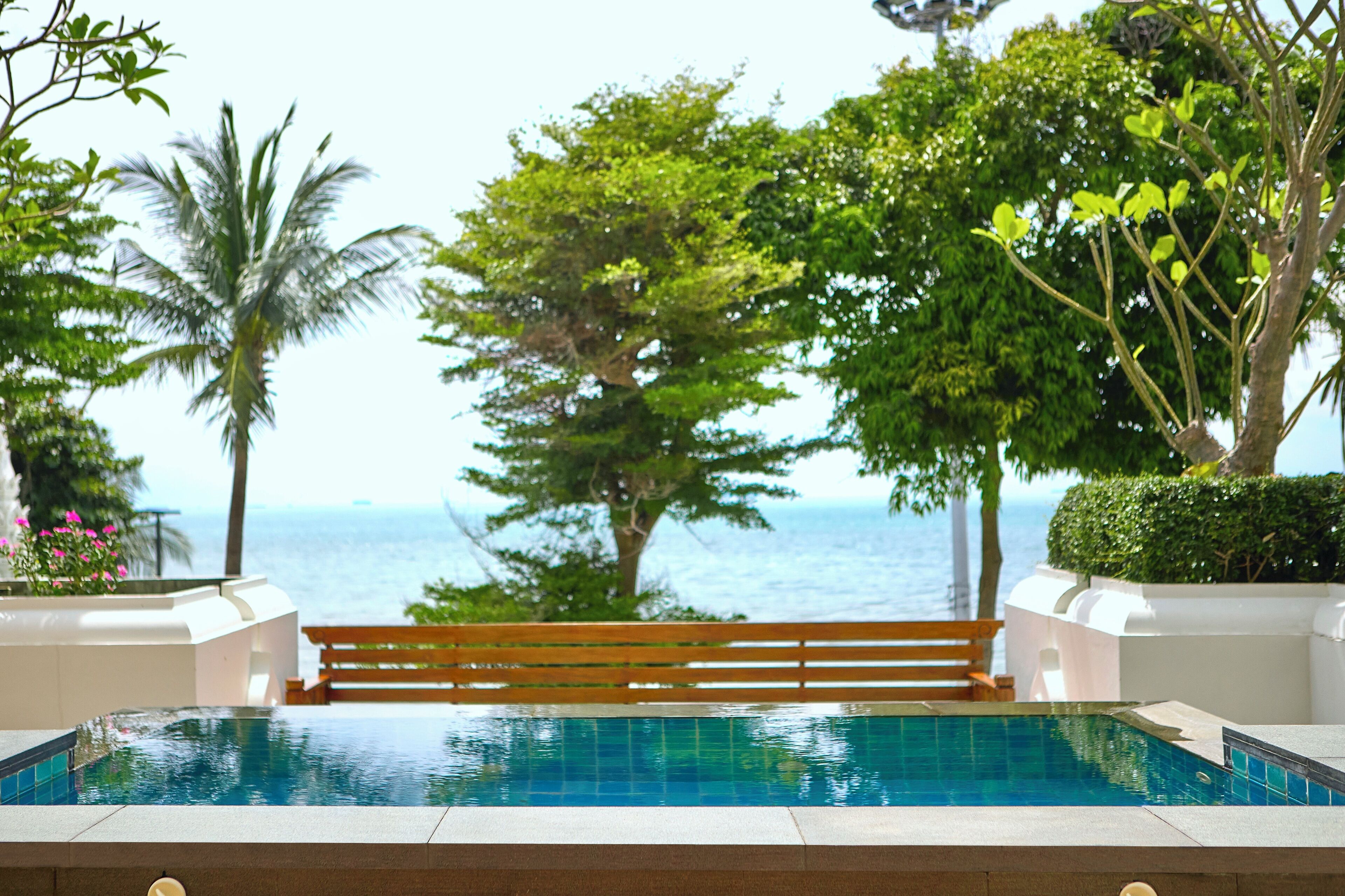 Beachfront Suite | Outdoor pool | 3 outdoor pools, pool umbrellas, pool loungers