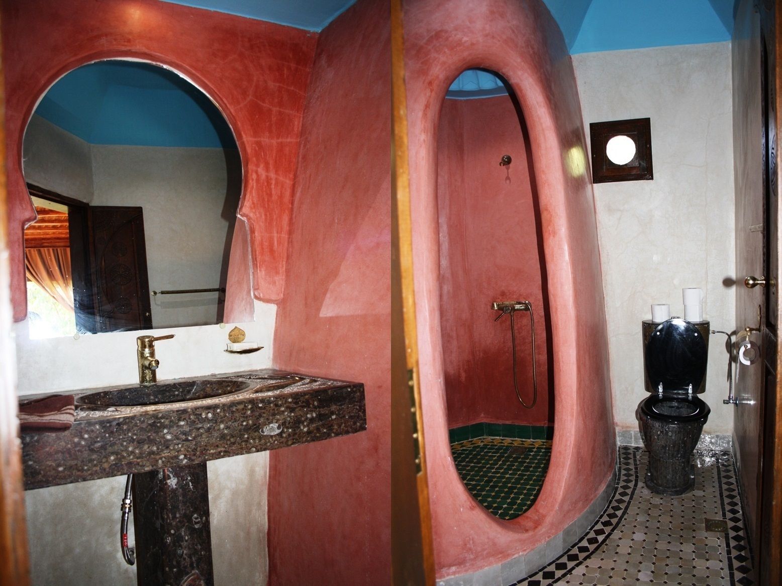 Een badkamer met een bijzondere gebogen wasbak, een douche met een klein raam en een toilet met een zwart zitje.