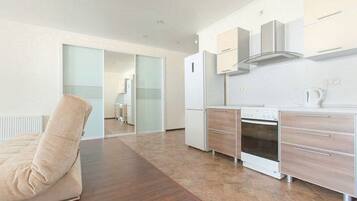 Comfort-huoneisto, keittiö | Oleskelualue | Taulutelevisio, lämmitetyt lattiat