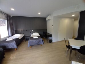 Desk, blackout drapes, soundproofing, iron/ironing board