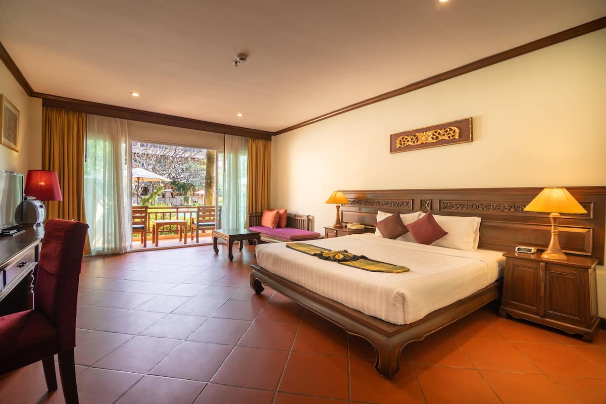 Double Room, Pool Access | Free minibar items, in-room safe, desk, blackout curtains