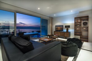 Apartment, 3 Bedrooms, Ocean View, Sea Facing | Living area | 30-inch flat-screen TV with cable channels, TV - The Beach House Apartment (Koh Samui)