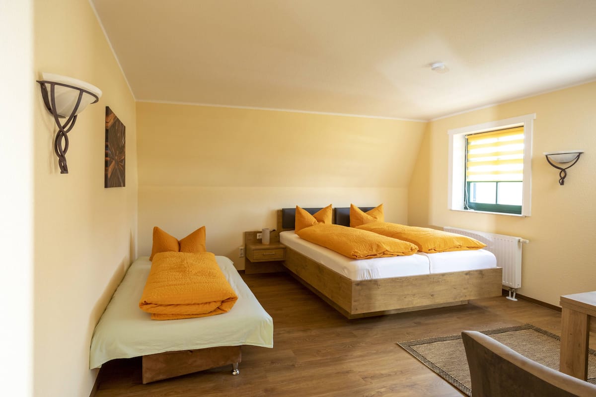 Standard Triple Room | Individually furnished, free WiFi, bed sheets