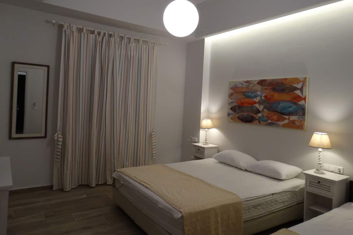 Apartment, Garden View | Iron/ironing board, free WiFi, bed sheets