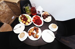 Daily buffet breakfast (USD 9 per person)