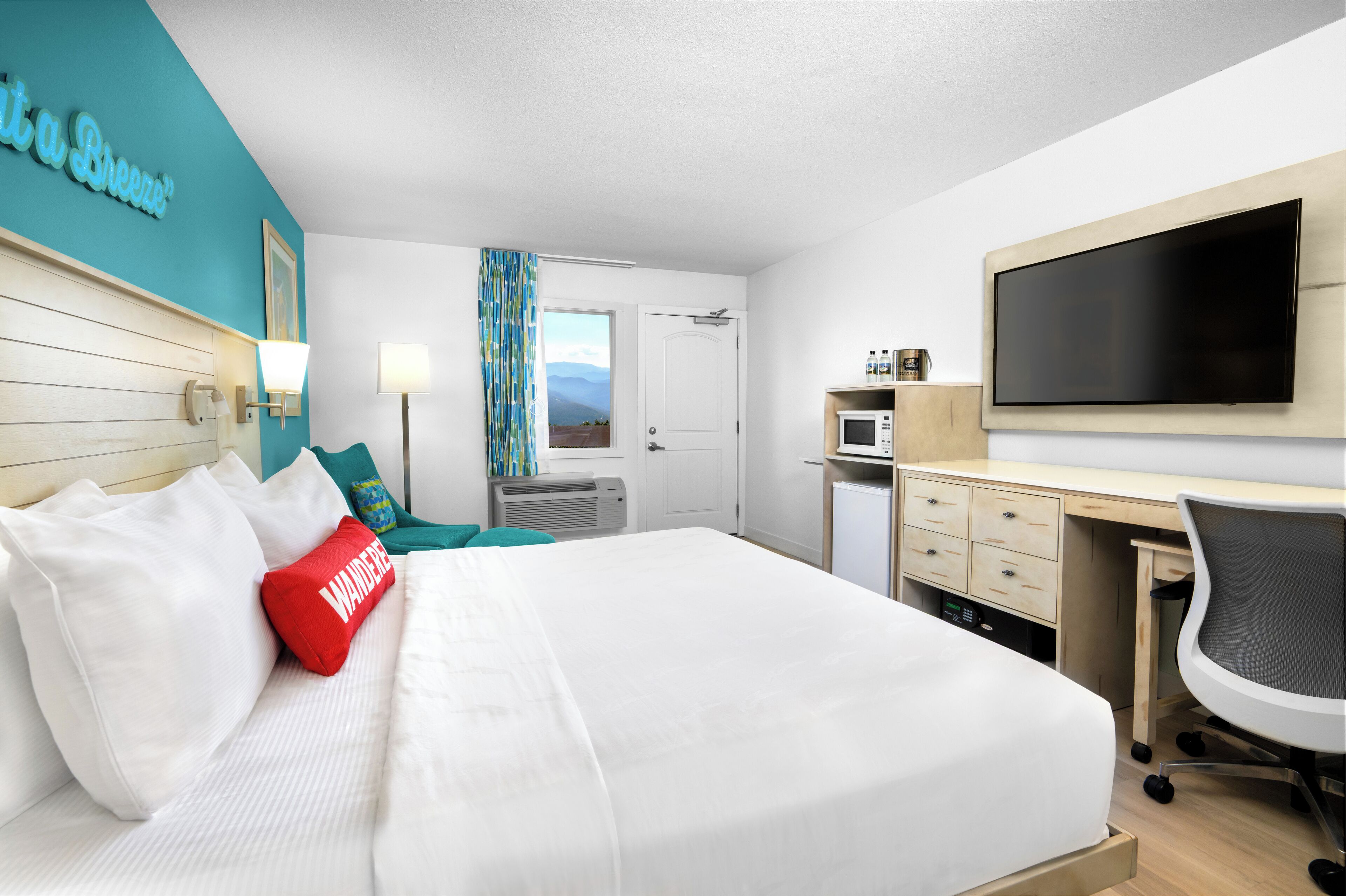 Premium bedding, down comforters, in-room safe, desk