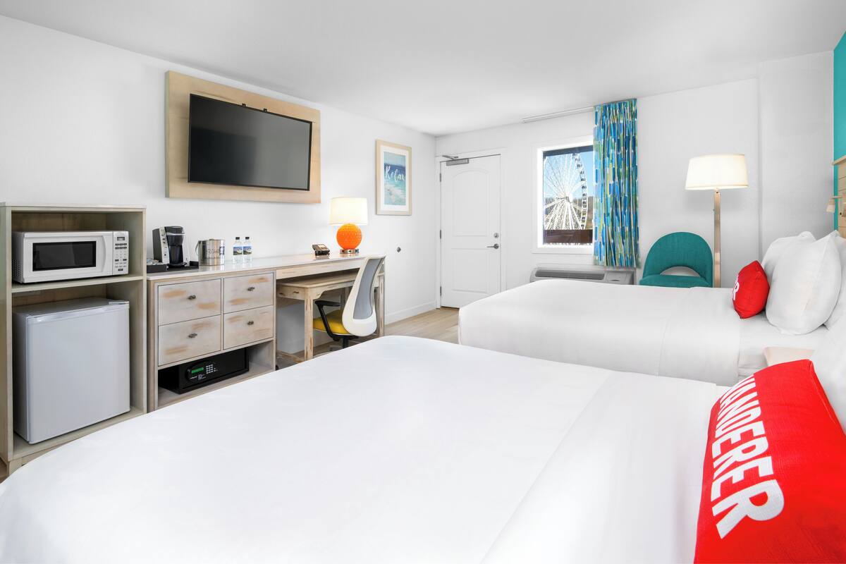 Premium bedding, down comforters, in-room safe, desk