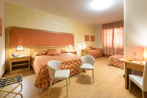 A hotel room with two beds, a desk, two chairs, a telephone, and a lamp. - Leone De Castris Wine Hotel (Salice Salentino)