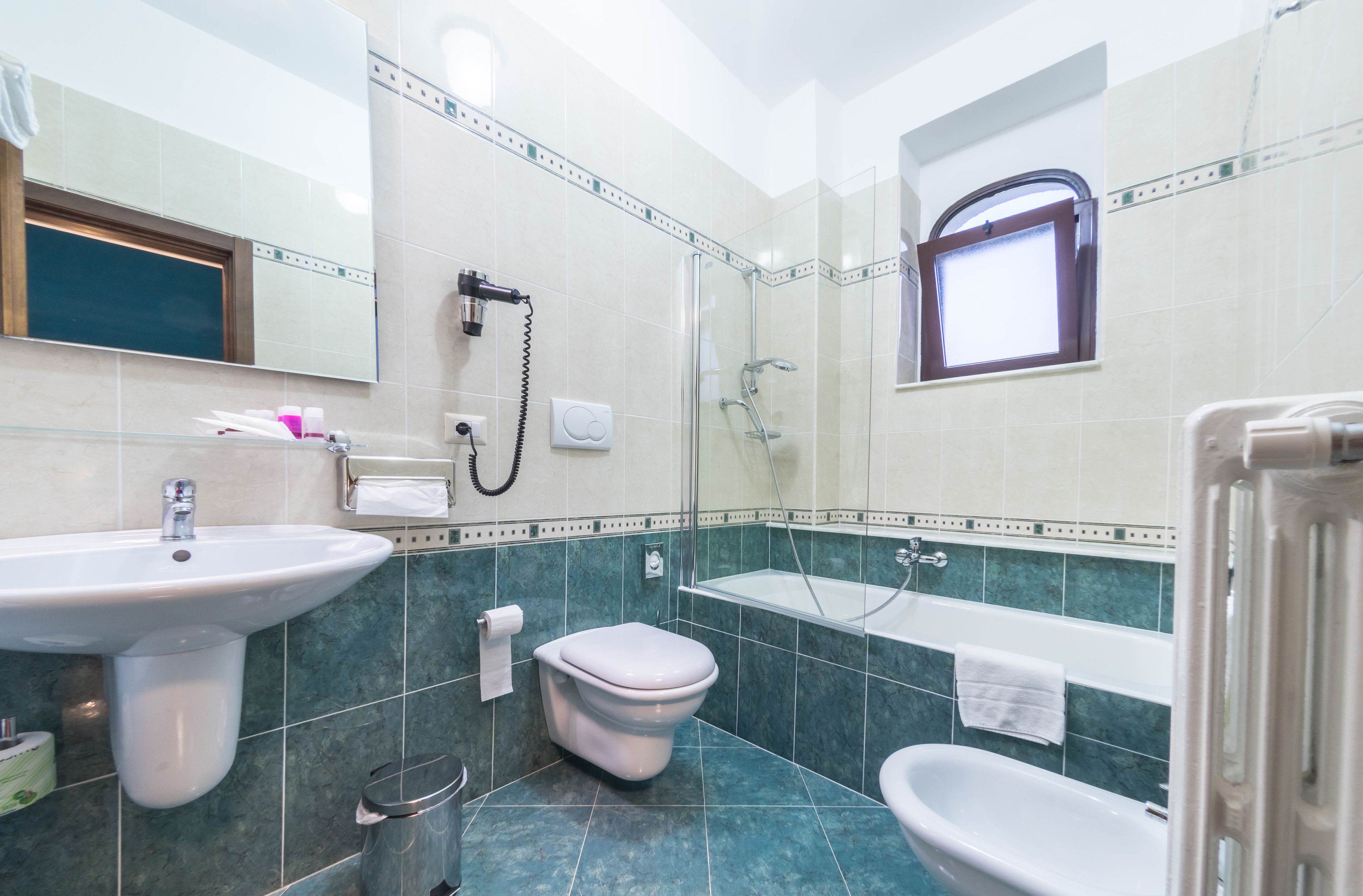 junior suite | bathroom | free toiletries, hair dryer, slippers, bidet