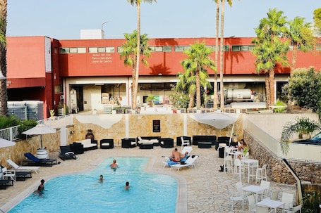 Seasonal outdoor pool. Leone De Castris Wine Hotel