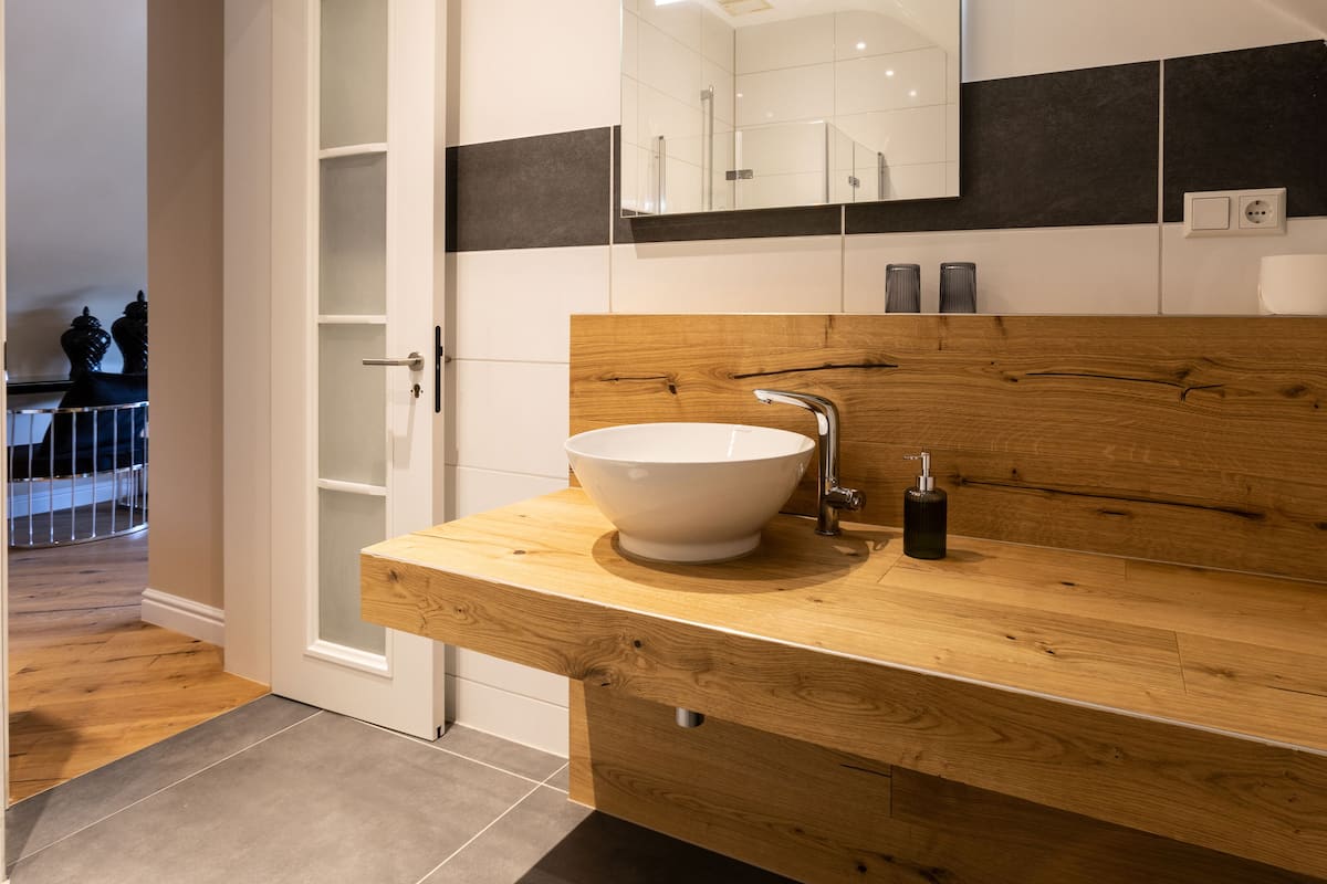 design studio suite, 1 queen bed | bathroom | hair dryer, towels