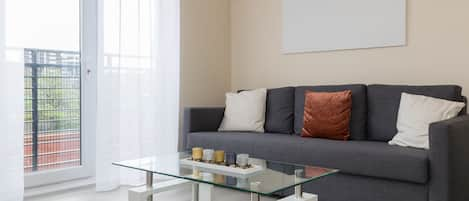 Family Apartment, 2 Bedrooms | Living room | Flat-screen TV