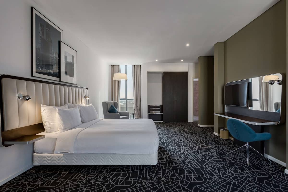 Suite, 1 Bedroom | 1 bedroom, in-room safe, desk, laptop workspace