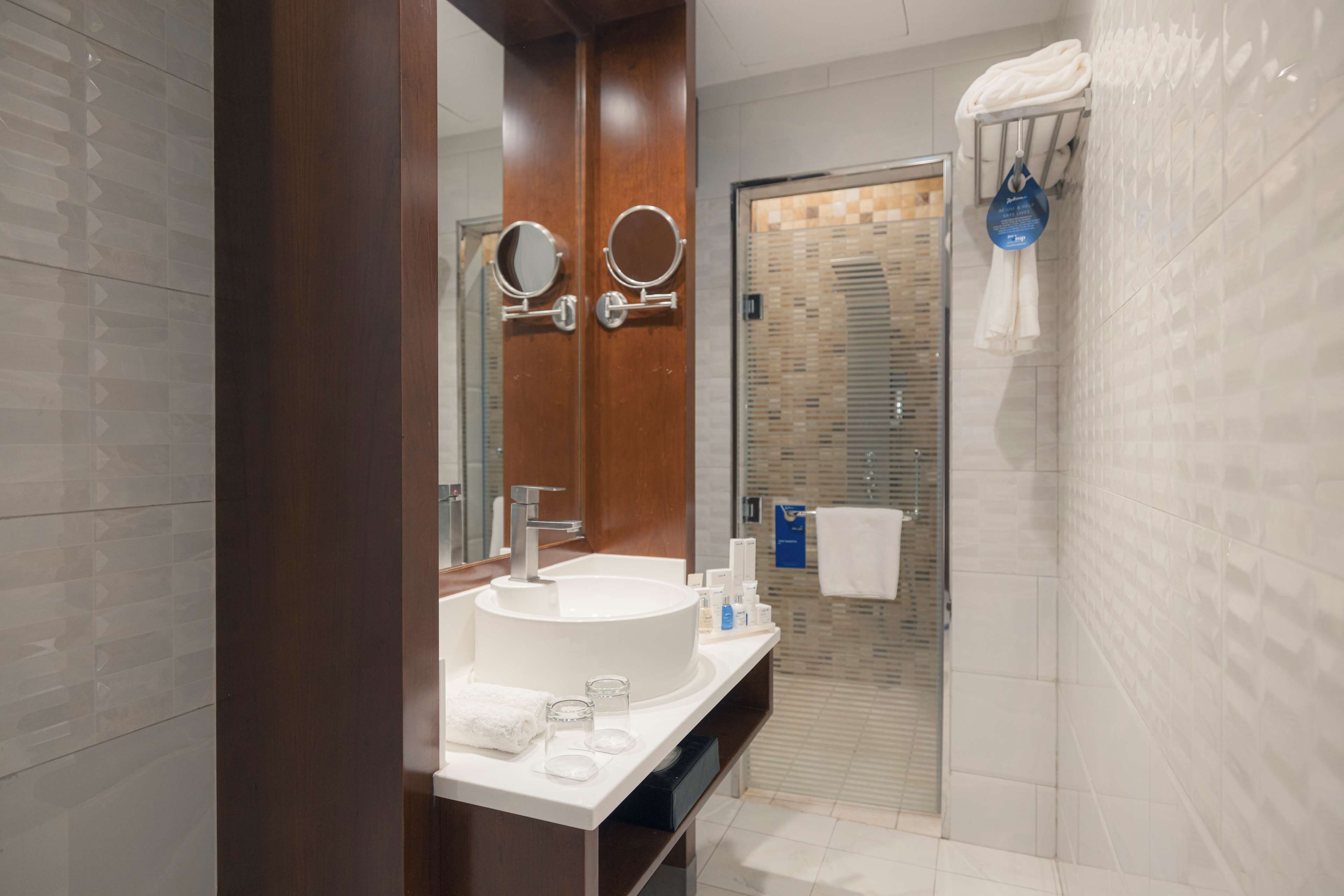 suite, 2 bedrooms, city view | bathroom | combined shower/bathtub, free toiletries, hair dryer, slippers