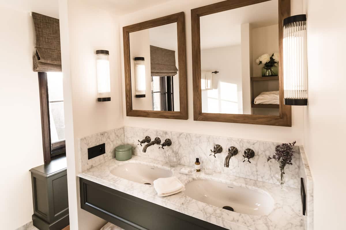 suite 2 | bathroom | designer toiletries, hair dryer, bathrobes, towels