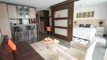 Standard Apartment, 1 Bedroom | Living room | Flat-screen TV