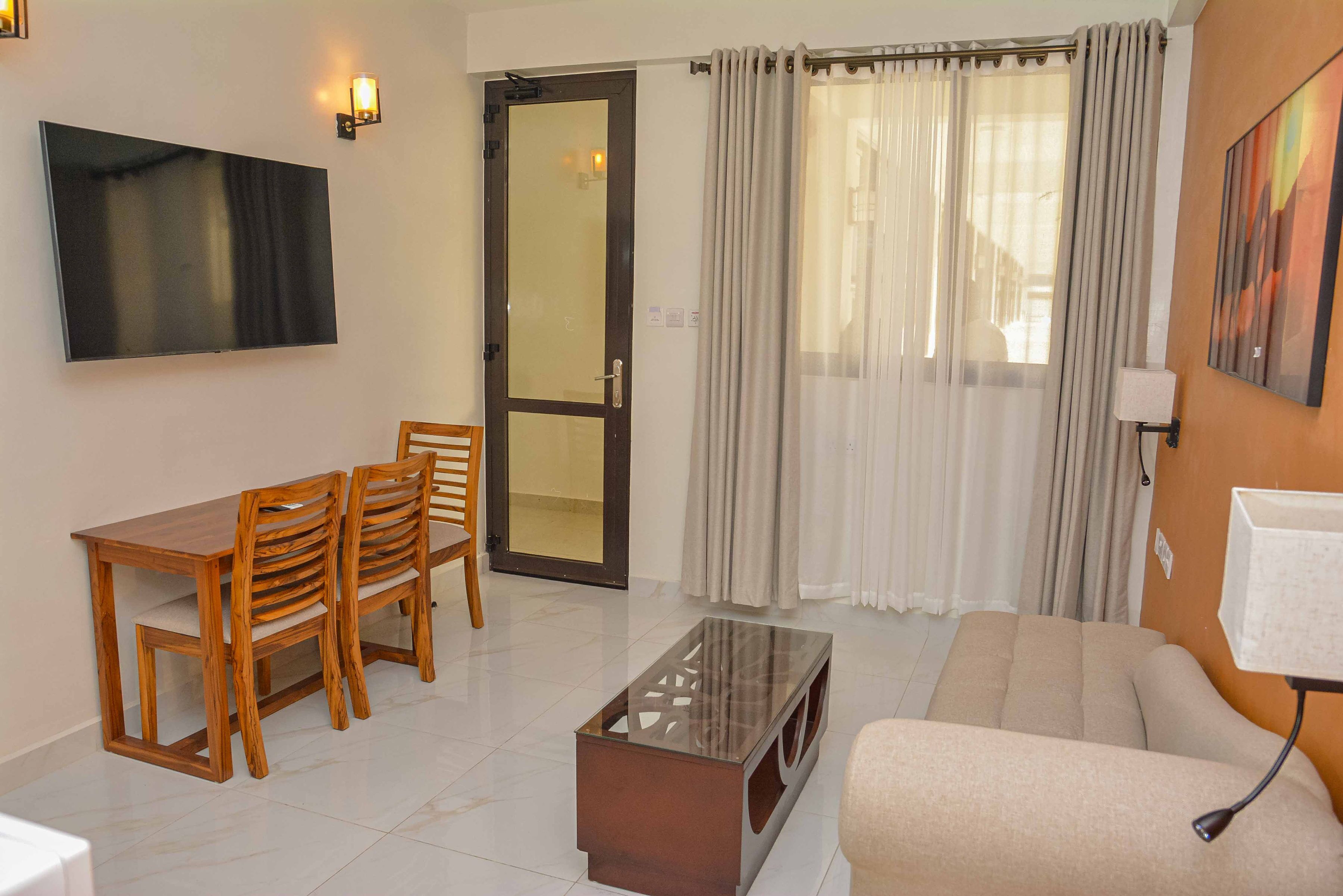 suite room with living room including kitchen, jacuzzi in the room | living area | 53-inch smart tv with digital channels, tv, netflix