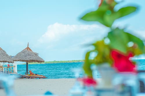 Private beach, white sand, sun-loungers, beach umbrellas