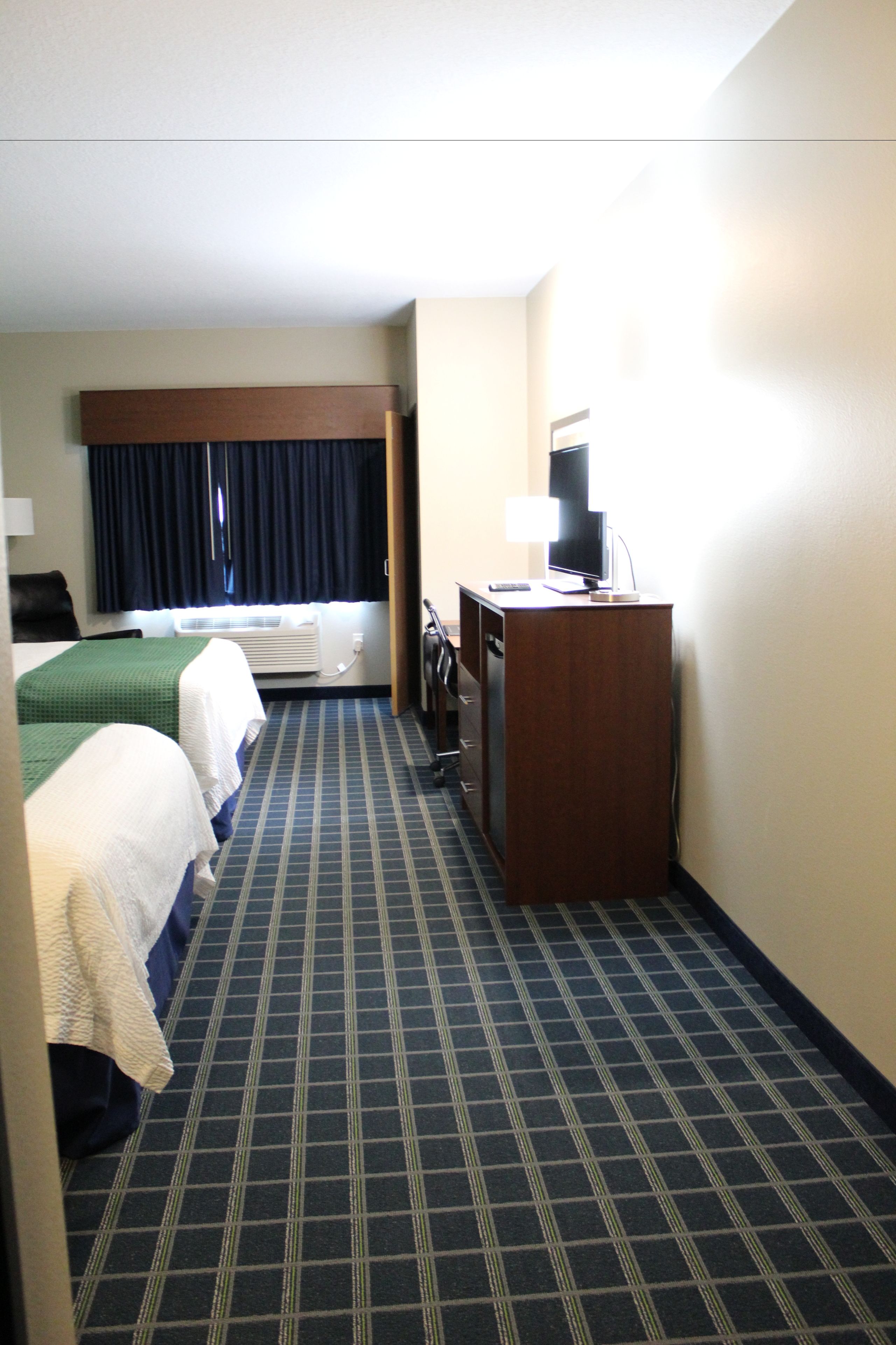 deluxe room, 2 queen beds | premium bedding, desk, iron/ironing board, cots/infant beds