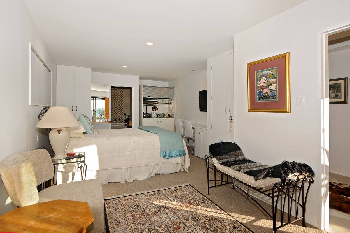 Luxury Suite, 1 Queen Bed, Kitchenette, Ocean View | Premium bedding, minibar (some free items), desk, iron/ironing board