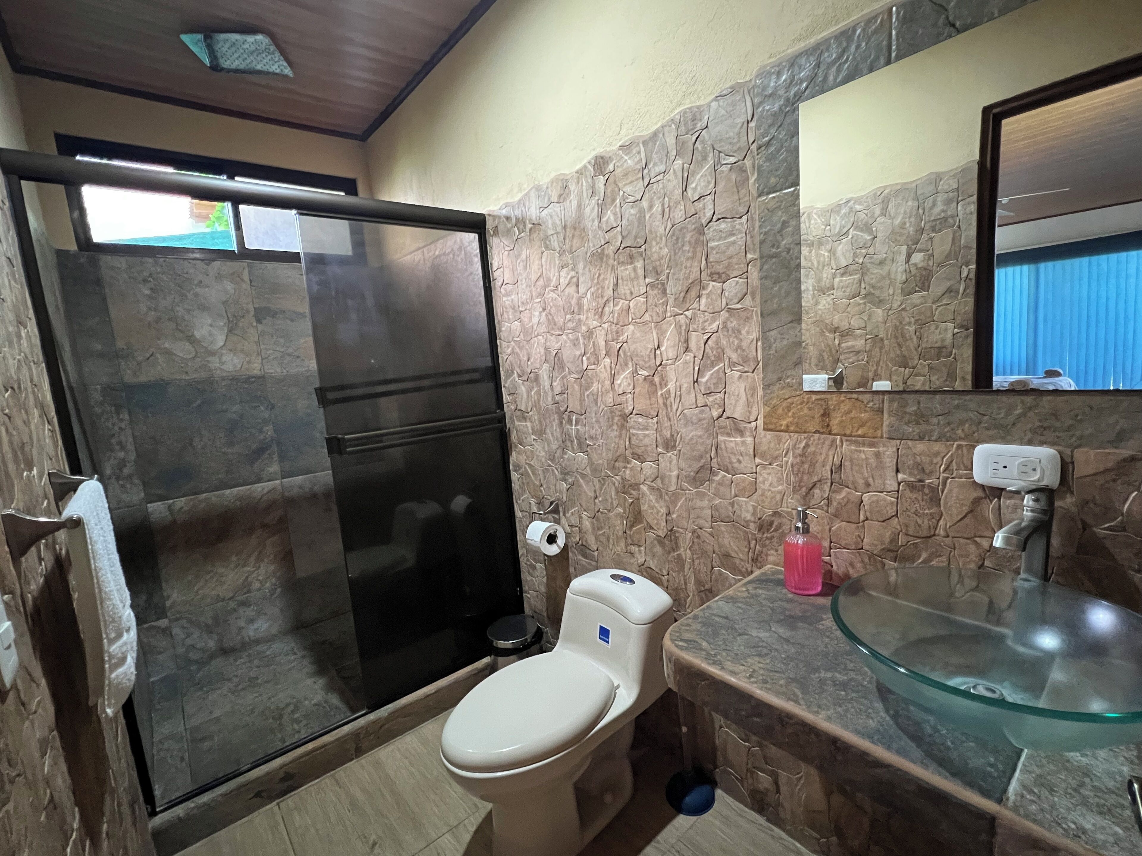 superior studio suite | bathroom | shower, towels