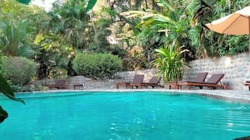 Outdoor pool, pool umbrellas, pool loungers