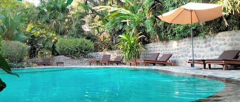 Outdoor pool, pool umbrellas, sun loungers