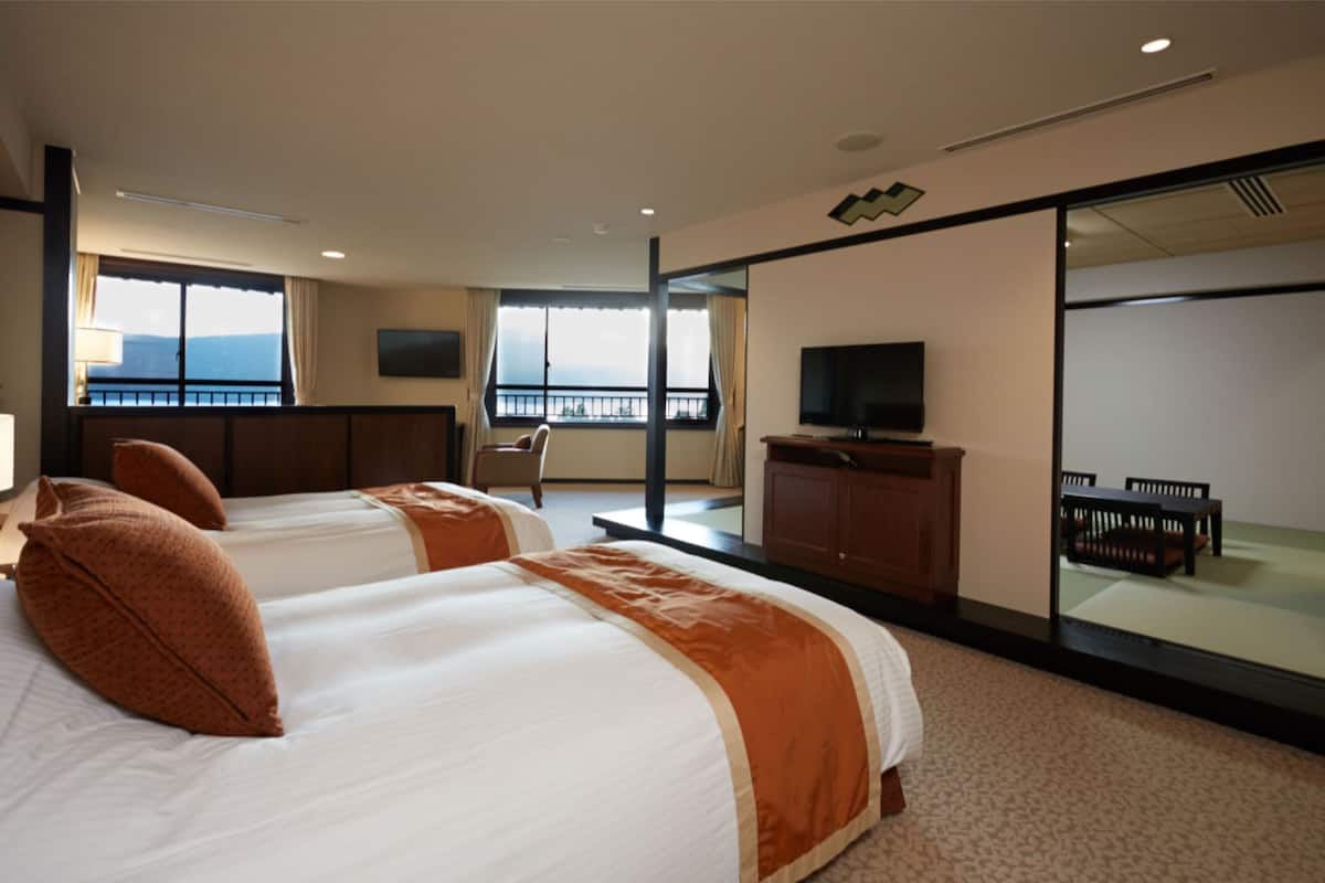 japanese western-style room, 3rd floor, fuji mountain view | premium bedding, minibar, in-room safe, desk