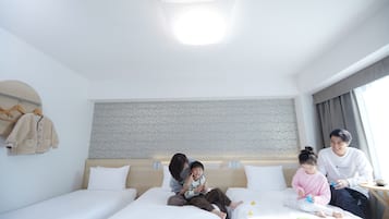 Twin Room with Extra Bed, Non Smoking | In-room safe, desk, soundproofing, iron/ironing board