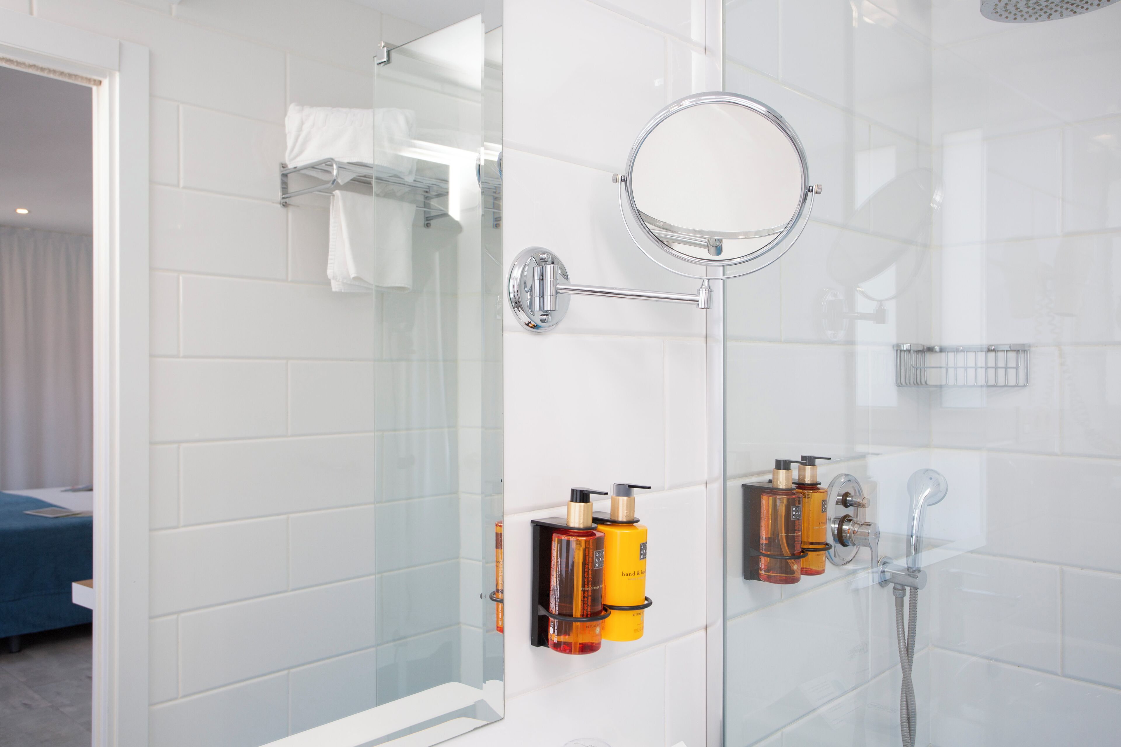 shower, free toiletries, hair dryer, towels