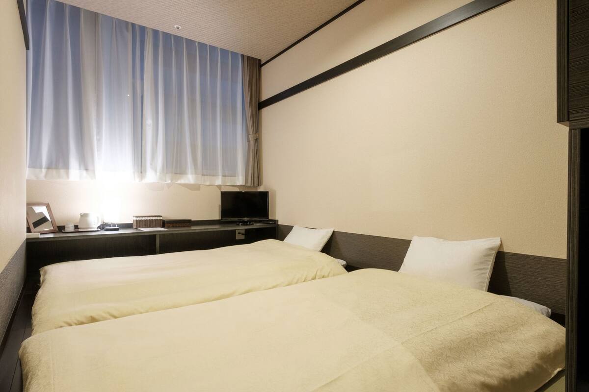 Blackout curtains, iron/ironing board, free WiFi, bed sheets