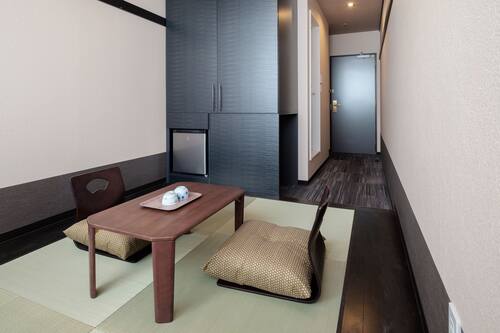 Blackout curtains, iron/ironing board, free WiFi, bed sheets