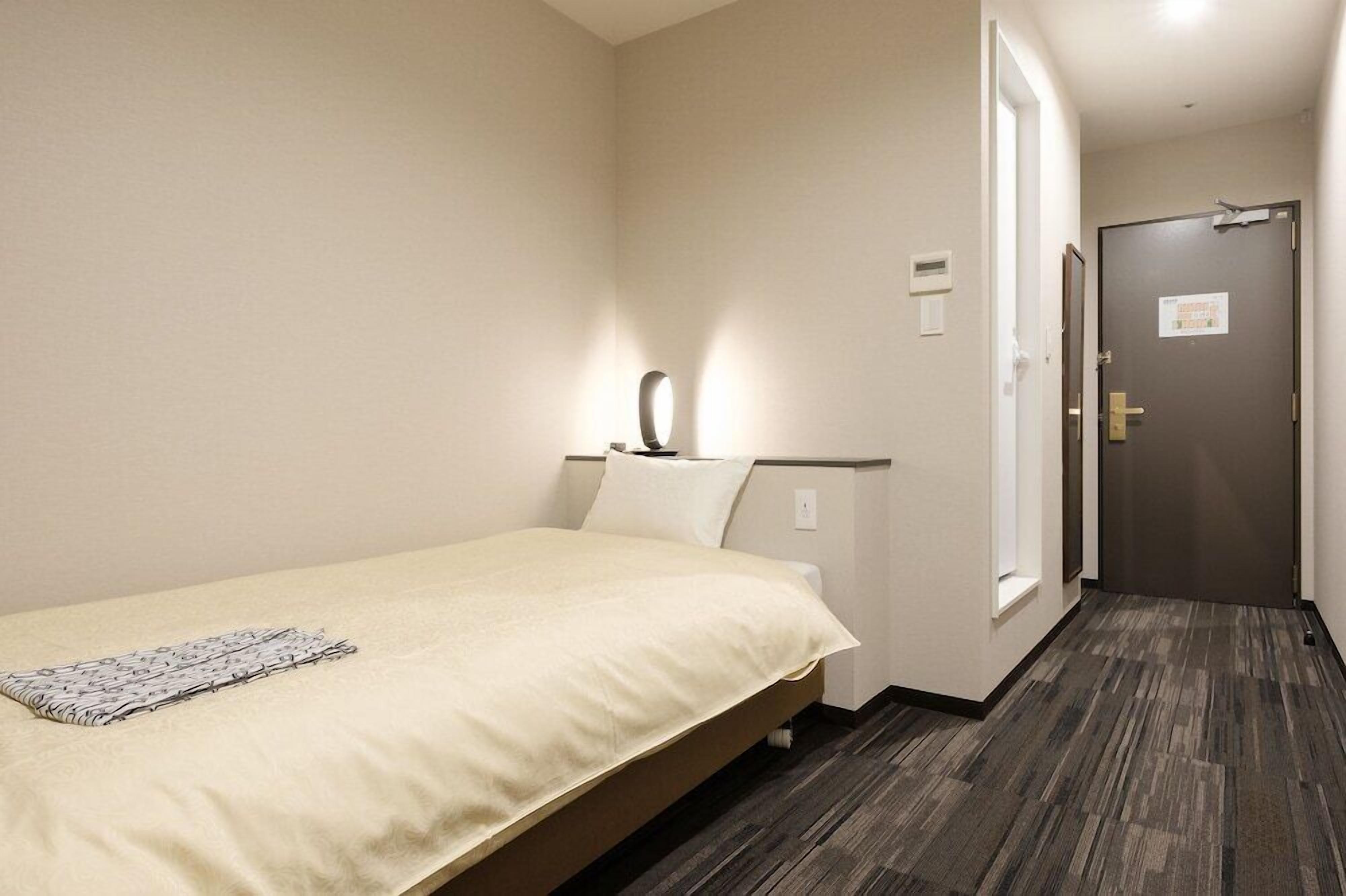 Blackout curtains, iron/ironing board, free WiFi, bed sheets