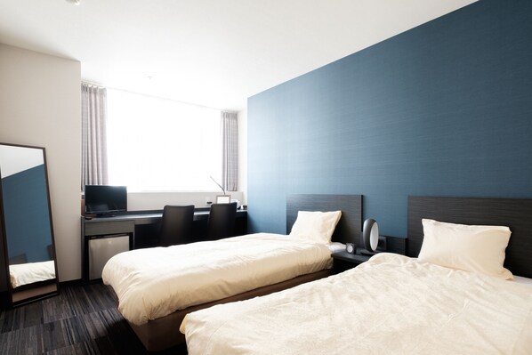 Blackout curtains, iron/ironing board, free WiFi, bed sheets