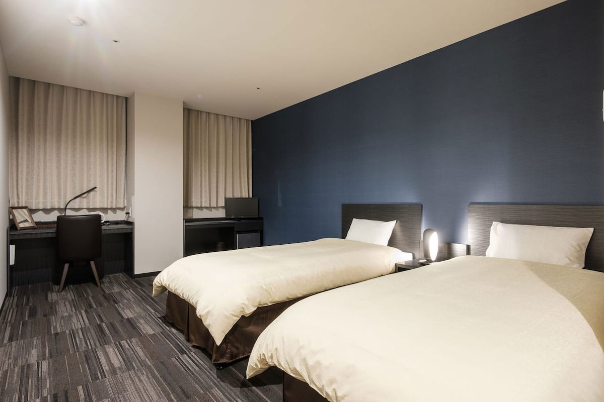 Blackout curtains, iron/ironing board, free WiFi, bed sheets