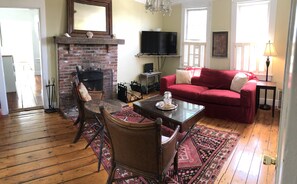 Smart TV, fireplace, DVD player, books