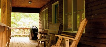 Classic mountain cabin with beautiful stone fireplace in a rural setting