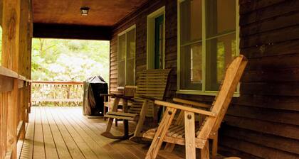 Classic mountain cabin with beautiful stone fireplace in a rural setting