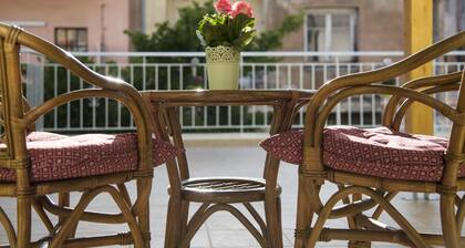 Two Roses: the Olive House