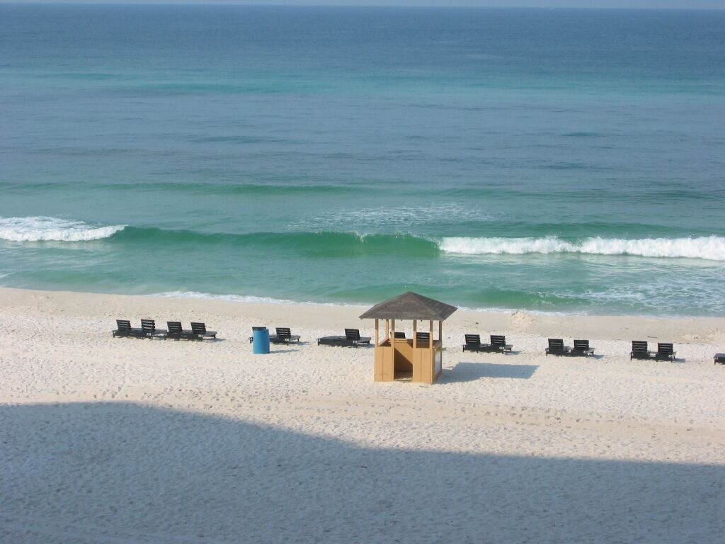 On the beach, sun-loungers, beach towels