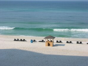 On the beach, sun-loungers, beach towels