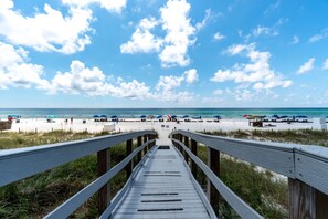 On the beach, sun-loungers