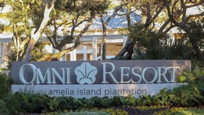 A sign for Omni Resort Amelia Island Plantation with a logo and name. - Spectacular Ocean Front Amelia Island Plantation, Breathtaking Ocean View  (Fernandina Beach)