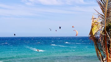 On the beach, sun loungers, beach towels