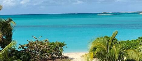 On the beach, sun loungers, beach towels