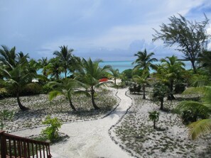 On the beach, sun-loungers, beach towels - LARGE 4 Bed/4Bath BEACHFRONT APARTMENT SLEEPS 8 and directly  on HOOPERS BAY (Georgetown)