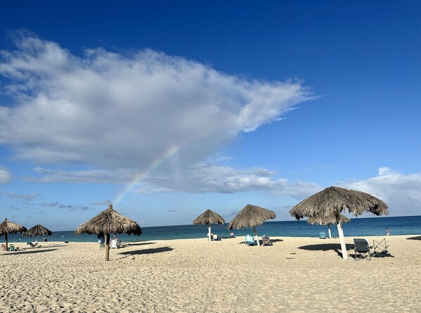 On the beach, sun-loungers, beach towels