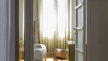 1 bedroom, desk, iron/ironing board, travel cot